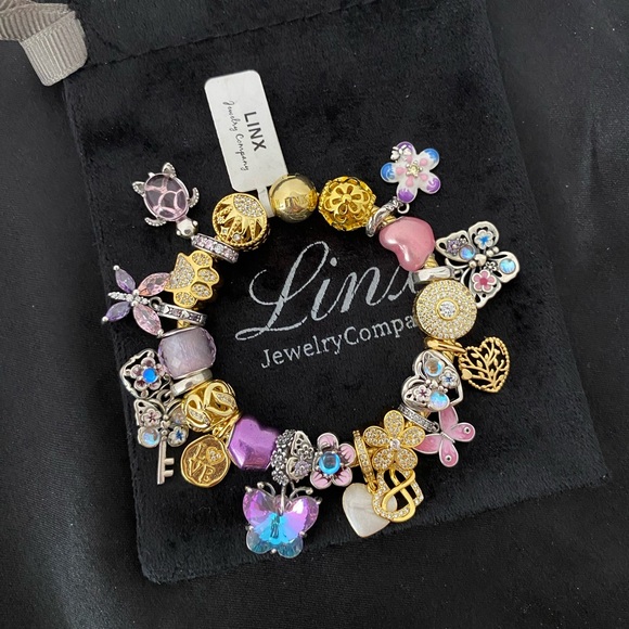 Linx Yellow Gold Bracelet with Gold Pink Blue and Purple Themed Charms